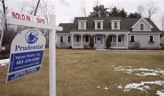 A&nbsp;"Sold in 2 Days" sign is seen at a home for sale in Concord, N.H. Sales of previously occupied homes tumbled for the second straight month in January.